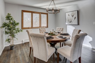 A handsome table is set in a home for sale